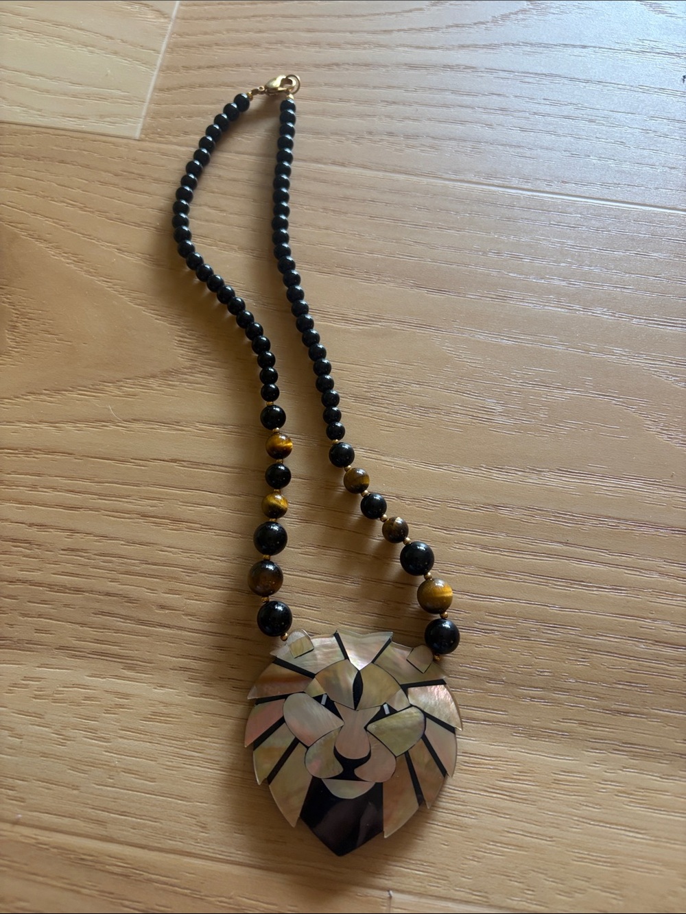 Mother of Pearl Black and Brown Beaded Necklace with Lion Pendant